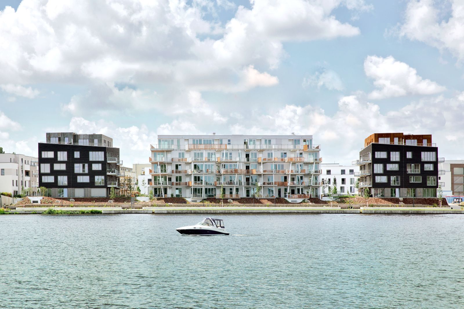 Construction site of the “Pier on the Water” project, showcasing the architectural structure and its integration with the surrounding landscape.